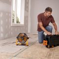 worx fan next to man opening up worx work table