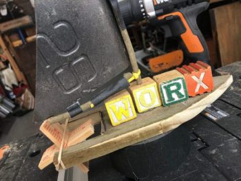 Worx drill with worx spelled out in color word cubes