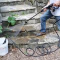 using pressure washer to lean off stone steps