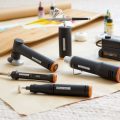 5 makerx crafting tools and makerx hub laying on brown paper