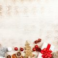 christmas decorations laying front down on wood table