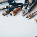 tools laid on white paper