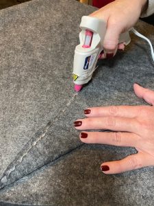 using glue gun to glue on to felt 