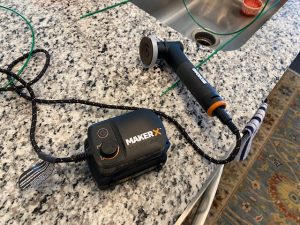 rotary grinder sitting on granite kitchen table