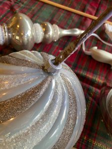 swirled silver ornament sanding down hole