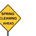 yellow road sign that says "spring cleaning ahead"