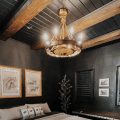 Tongue Groove Ceiling and wood beams in a dark painted room with picture frame