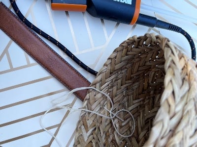 the thread being shown laying on inside of basket