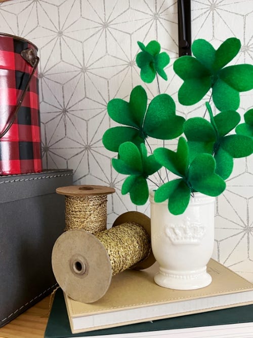 Festive St. Patrick's Day Felt Clover bouquet sitting on table