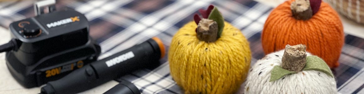 yellow, white, orange yarn pumpkins