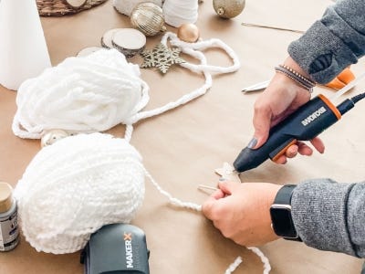 adding glue to wooden star