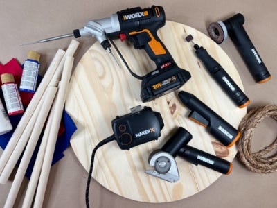 array of worx tools on top of the wooden round and dowels