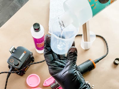 pouring resin into cup