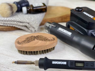 Wood mustache brush with wood and metal crafter and heat gun