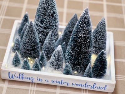 walking in winter wonderland chistmas tree tray with lights on