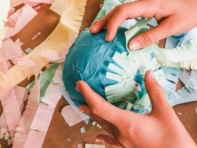 Adding colorful tissues to top of blue color hard coated ballon case