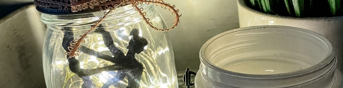 Fairy lantern lit up next to cap