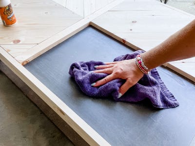 using towel clean top of surface