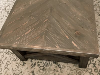 dried herringbone table on top of carpet