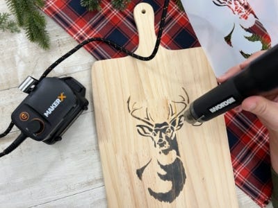 using burning tool on deer stencil