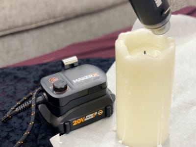 using heat gun to melt the top of the candle