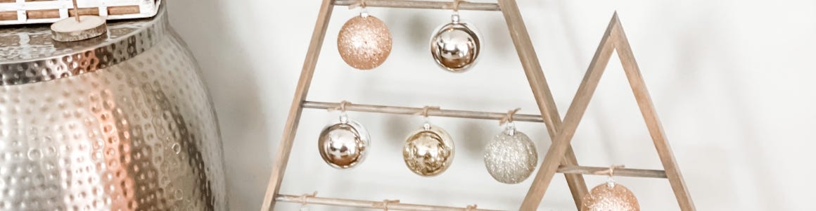 ornaments hanging from wooden display