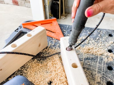 using rotary tool sander to make hole bigger