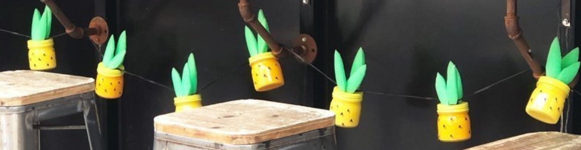 pineapple hanging jars on wall