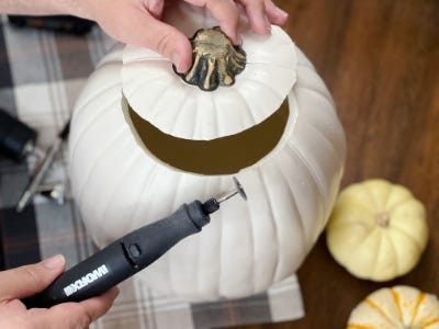 lifting cover of pumpkin from rotary tool