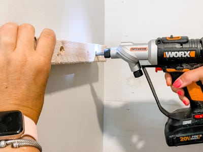 using worx drill to drill holes into wood piece