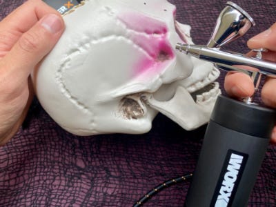 air brushing pink on the side of the skull