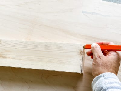 marking wood boards with pencil