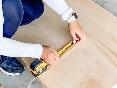 measuring from nail to edge of plywood board