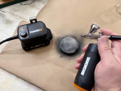 air brush painting cap black spot on brown paper