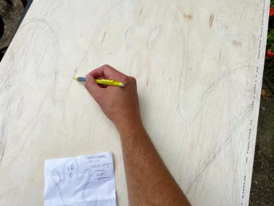 drawing a simple ghost shape on plywood with pencil