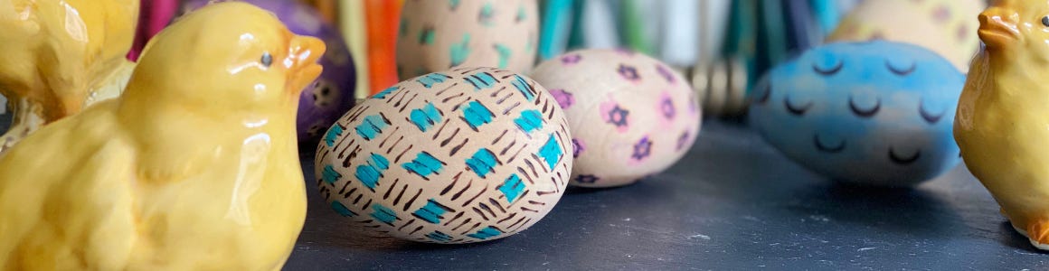 Wood burned eggs with fake yellow baby chickens