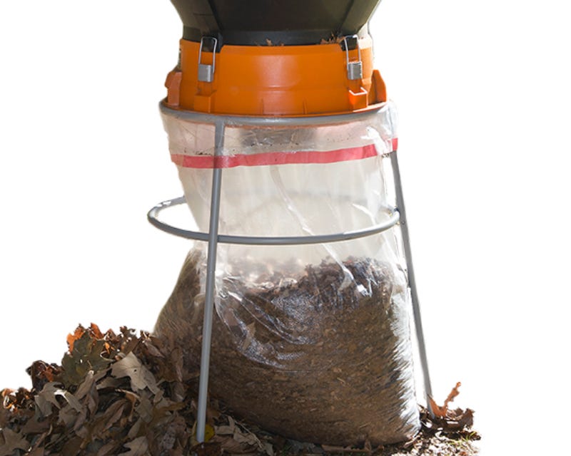 mulched leaves collected in the attached clear trash bag