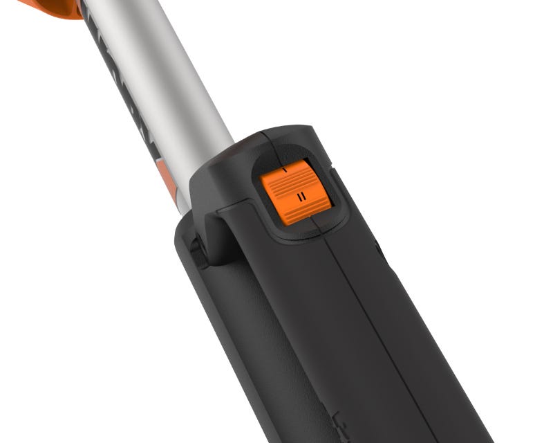 close up of the handle with the orange switch