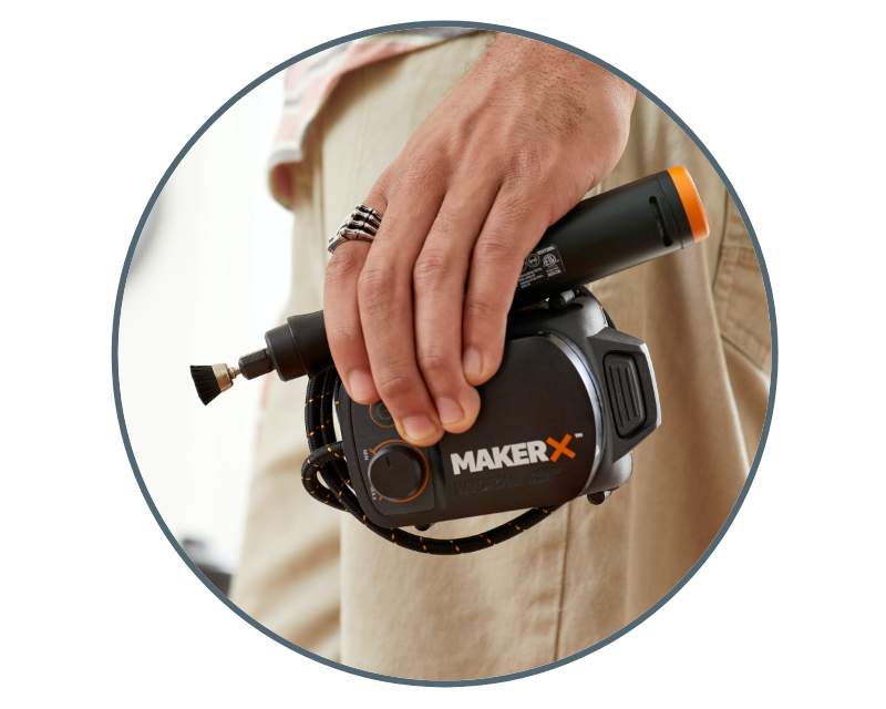 image of a person carrying the rotary tool and makerx hub