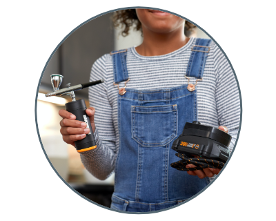 woman holding the air brush and the hub