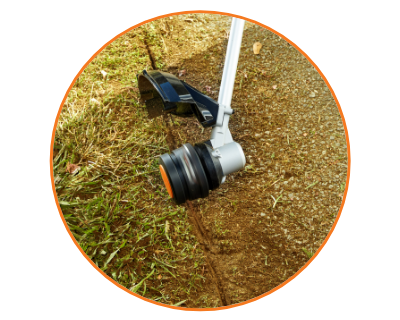 trimmer head on laying on the grass