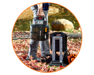 image of a person using the backback blower in a yard full of leaves