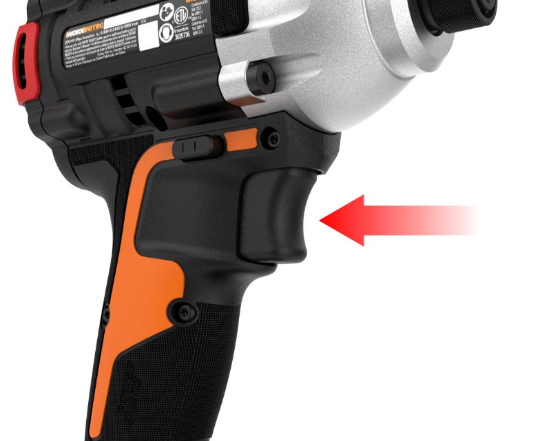 close up of the trigger with a red arrow to depict how it is squeezed