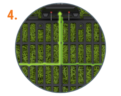 image of the charging base and a neon green line depicting how the landroid enters and leaves the base