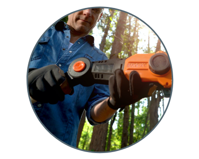 image of a man holding the saw