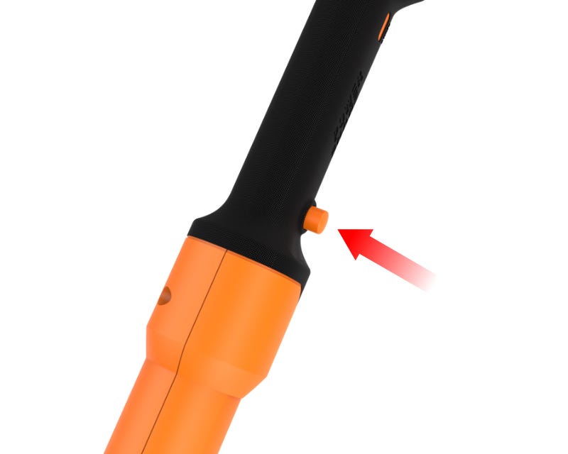 close up of the trimmer with the orange button and a red arrow depiciting how the button is pressed